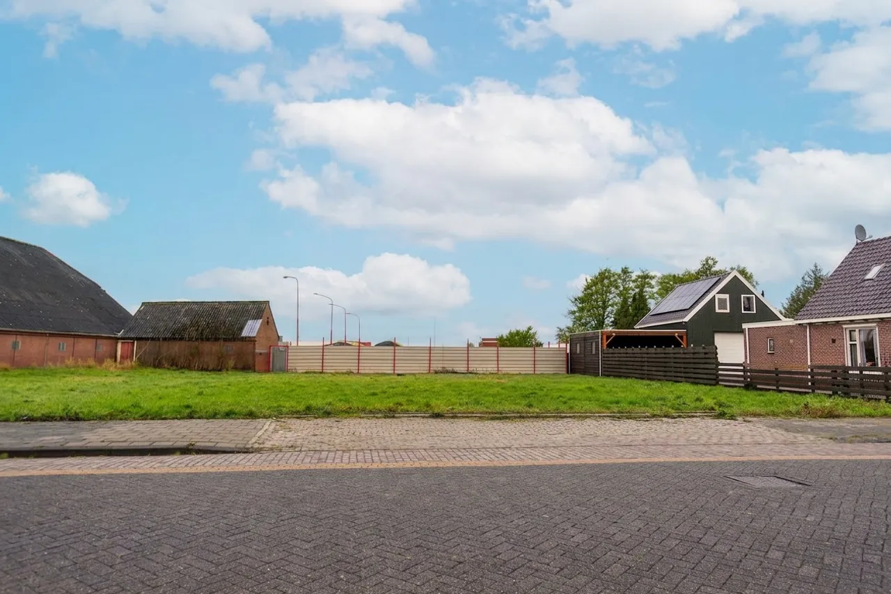 Enhanced real estate photo: bright blue sky and fresh green grass